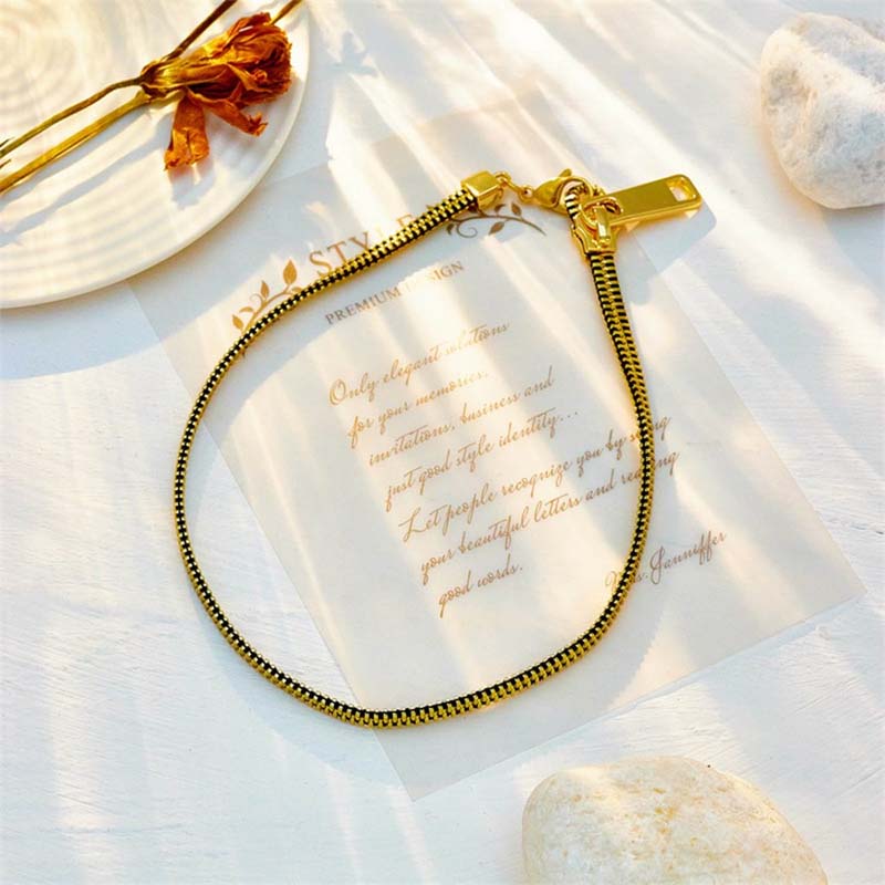 Zipper-inspirerat smyckese