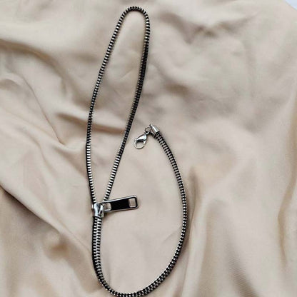 Zipper-inspirerat smyckese